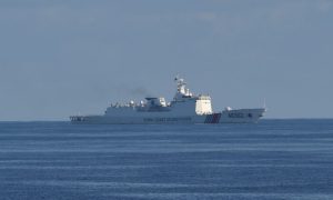 A Chinese coast guard ship sails along the area of the joint search and rescue exercise between Philippine and U.S. coastguards near Scarborough shoal in the South China Sea, on May 14, 2019.