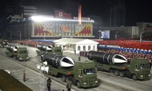 This photo provided by the North Korean government shows missiles during a military parade marking the ruling party congress, at Kim Il Sung Square in Pyongyang, North Korea Thursday, Jan. 14, 2021.