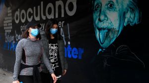 Lebanese women wear masks to help prevent the spread of the coronavirus, in Beirut, Lebanon, Wednesday, Jan. 27, 2021.
