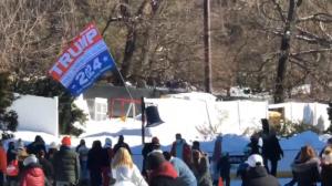 Dion Cini carrying "Trump 2024" flag at the Wollman Rink in New York City. Twitter/Screenshot