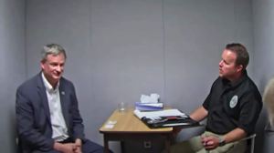 South Dakota attorney general Jason Ravnsborg (left) being questioned by investigators.