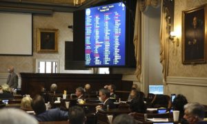 South Carolina Rep. David Hiott, R-Pickens, says a prayer as the House votes on a bill that would ban most abortions in the state in Columbia, S.C., on Feb. 17, 2021.
