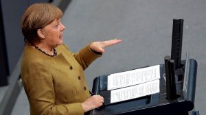 German Chancellor Angela Merkel delivers a speech during a meeting of the German federal parliament, Bundestag, at the Reichstag building in Berlin, Germany, Thursday, Feb. 11,