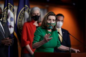 Speaker of the House Nancy Pelosi, D-Calif., meets with reporters before the House votes to pass a $1.9 trillion pandemic relief package, during a news conference at the Capitol in Washington, Friday, Feb. 26, 2021.