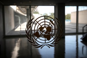 The United Nations logo is seen on a window in an empty hallway at United Nations headquarters during the 75th annual U.N. General Assembly high-level debate. REUTERS pic