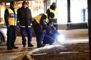 Police are seen in the area after several people were attacked in Vetlanda, Sweden, Wednesday, March 3, 2021.