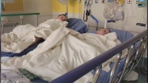 Hillarie Galazka's twins are seen here holding hands in the hospital after she gave her life to save theirs.