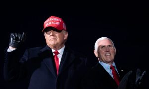President Donald Trump arrives with Vice President Mike Pence for a Make America Great Again rally at Cherry Capital Airport in Traverse City, Michigan on Nov. 2, 2020.