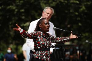New York Mayor Bill de Blasio listens to his wife, First Lady Chirlane McCray. (Spencer Platt/Getty Images/TNS)