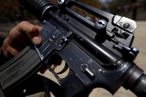 An AR-15 bears a marking showing it was made in Hartford, Conn. (Gary Coronado/Los Angeles Times/TNS)
