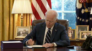 President Joe Biden signs the American Rescue Plan package of legislation March 11, 2021, at in the Oval Office at the White House.

Facebook / The White House
