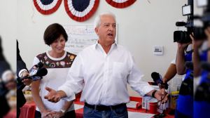 California Republican gubernatorial candidate John Cox speaks during campaign stop as Rep. Mimi Walters, R-Calif., looks on in Irvine, Calif. 