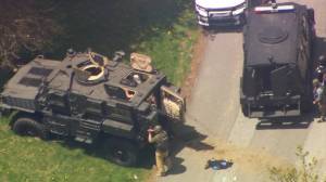 Deputies shot in Watauga County SWAT teams and other law enforcement officers stage outside a home in Boone after two deputies were shot Wednesday morning.