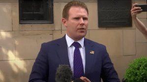 Andrew Giuliani, son of former New York Mayor Rudy Giuliani, speaks to reporters outside the building where his father lives, 