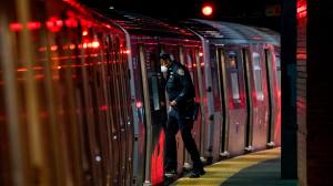 A Metopolitan Transportation Authority Police(MTA) officer looks for passengers at,