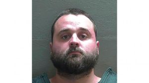 In this undated booking photo released by the Escambia County Sheriff's Office is Jared Paul Stanga, 30, in Fla.