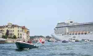 Activists in Venice protesting against cruise ships as the MSC Orchestra left the city from the Giudecca Canal earlier this month.