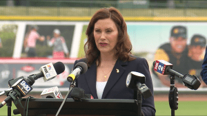 Gov. Gretchen Whitmer announces May 20, 2021, she will lift many COVID-19 restrictions on June 1. 

Screenshot of WoodTV livestream