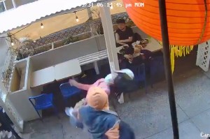 The man attacking the woman in Chinatown on May 31, 2021.
Twitter,