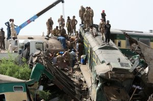 Security personnel carry out rescue operations at the site of a train accident in Daharki area of the northern Sindh province on June 7, 2021. (Photo by -/AFP via Getty Images)