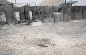 Impact crater at Al Asad Air Base, Iraq, following a rocket attack on March 3, 2021.