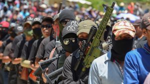 Vigilantes of "El Machete" as they call themselves, an armed group made up mostly of indigenous people to defend themselves against drug cartels, are seen during an assembly with indigenous communities,