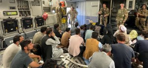 U.S. Marine Corps Gen. Frank McKenzie, the commander of U.S. Central Command, enters a plane evacuating Afghans from Hamid Karzai International Airport, Afghanistan, on August 17, 2021. U.S. NAVY / CAPT. WILLIAM URBAN