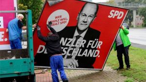 REUTERS The election banners are being packed away, but a lot of work lies ahead to form Germany's new government