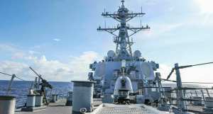 Arleigh Burke-class guided-missile destroyer USS Benfold (DDG 65) sails through the South China Sea on Sept. 8, 2021. (U.S. Navy photo by Deanna C. Gonzales)