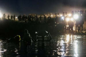 Migrants seeking refuge in the US cross the Rio Grande river from Mexico toward Del Rio, Texas, on Sept. 23, 2021.
REUTERS/Daniel Becerril