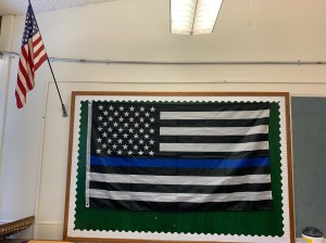 A local school district forced a middle school teacher to take down a pro-police flag from her classroom wall. Yet the district allows Black Lives Matter and LGBT messages to be displayed. (Photo: Submitted by Chris Sutherland)