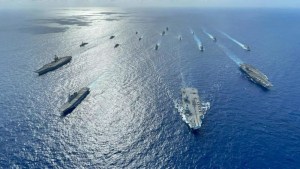 UK’s HMS Queen Elizabeth (R 08), and Japan’s JS Ise (DDH 182) with U.S. Navy carrier strike groups led by USS Ronald Reagan (CVN 76) and USS Carl Vinson (CVN 70) in the Philippine Sea Oct. 3, 2021. (Gray Gibson/U.S. Navy)