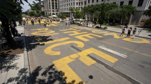 "Defund the Police" is painted on the street in Black Lives Matter Plaza near the White House in Washington, D.C., on Sunday, June 14, 2020.  (Stefani Reynolds/Bloomberg via Getty Images)