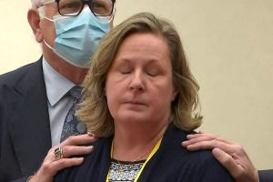 Kimberly Potter, a former police officer who has said she mistakenly used her handgun instead of her Taser when firing at Daunte Wright, 20, as he attempted to flee in his car following a traffic stop, reacts on a guilty verdict in a still image from video in Minneapolis, Minnesota, U.S. December 23, 2021. Pool via REUTERS