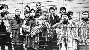 GETTY IMAGES
Image caption,
Child survivors at the Nazi concentration camp at Auschwitz-Birkenau in southern Poland in 1945