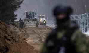 Construction of the border wall under way near the Polish village of Tołcze. Photograph: Wojtek Radwański/AFP/Getty Images