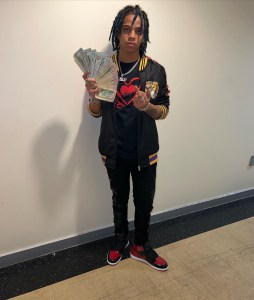Camrin Williams, who is accused of shooting an NYPD cop, has a YouTube page where he regularly shows off weapons and huge wads of cash.
Instagram/cblu_180