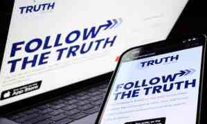Truth Social allows users to post and share a “truth” the same way they would share a tweet. Photograph: Leon Neal/Getty Images