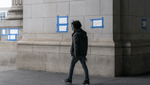 Blue tape and plastic covers swastikas drawn by vandals on the front of Union Station near the Capitol in Washington, (AP Photo/J. Scott Applewhite) 