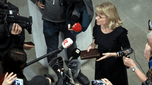 MP of the Finland's Christian Democrats Paivi Räsänen holds a bible as she speaks to media ahead of a court session at the Helsinki District Court in Helsinki, Finland. ( (Photo by ANTTI AIMO-KOIVISTO/Lehtikuva/AFP via Getty Images))