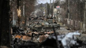 Destroyed Russian armored vehicles litter the battlefield in the city of Bucha, west of Kyiv, in early March.