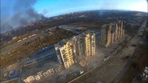 An aerial view shows damaged residential buildings, amid Russia's invasion of Ukraine, in Mariupol, Ukraine March 14, 2022.Azov regiment press service/via REUTERS