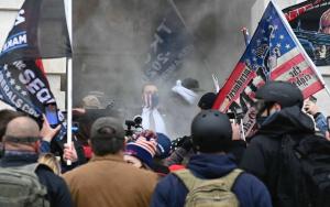 Demonstrators are tear gassed outside the U.S. Capitol in Washington, D.C., on, Jan. 6, 2021.(Andrew Caballero-Reynolds/AFP/Getty Images/TNS)