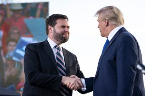 J.D. Vance, a Republican candidate for U.S. Senate in Ohio, shakes hands with former President Donald Trump during a rally hosted by the former president at the Delaware County Fairgrounds on April 23, 2022 in Delaware, Ohio. (Photo by Drew Angerer/Getty Images)