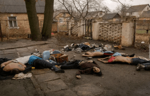Image 3 of 4
EDS NOTE: GRAPHIC CONTENT - Lifeless bodies of men, some with their hands tied behind their backs lie on the ground in Bucha, Ukraine, Sunday, April 3, 2022. (AP Photo/Vadim Ghirda)