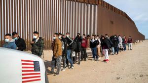 Dec. 7, 2022: Immigrant men from many countries are taken into custody by U.S. Border Patrol agents at the U.S.-Mexico border on December 07, 2021 in Yuma, Arizona. (Photo by John Moore/Getty Images) (John Moore/Getty Images)