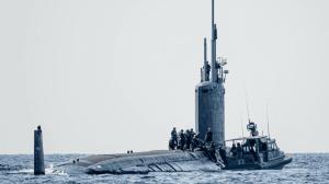 A 34-foot Dauntless-class patrol boat transfers supplies to the USS Texas (SSN 775). (U.S. Navy photo by Hospital Corpsman 1st Class Kenji Shiroma)
