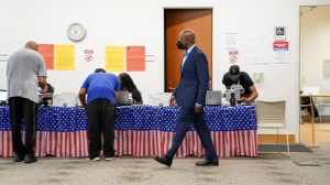 U.S. Sen. Raphael Warnock arrives at a polling station in Atlanta, Georgia, May 6, 2022. (Reuters/Elijah Nouvelage)