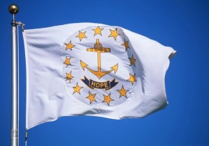 The state flag of Rhode Island waves in the wind.

Joseph Sohm / Shutterstock.com