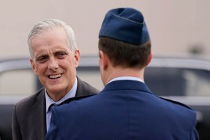 Secretary of Veterans Affairs Denis McDonough speaks with a member of the U.S. Air Force after stepping off Air Force One with President Joe Biden at Naval Air Station Joint Reserve Base, Tuesday, March 8, 2022, in Fort Worth, Texas. 

AP Photo/Patrick Semansky